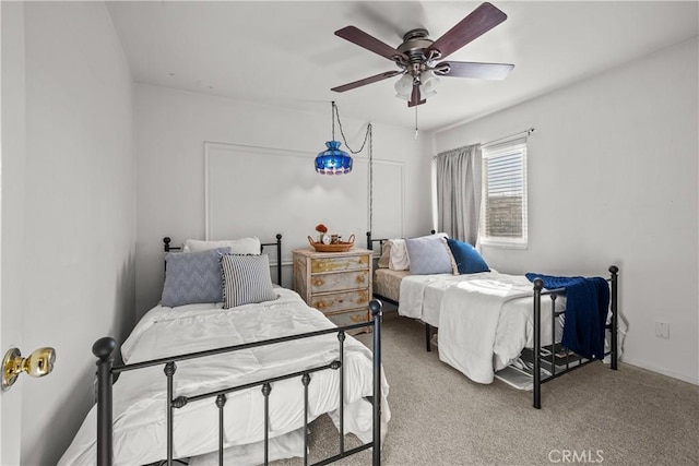 bedroom featuring a ceiling fan and carpet flooring