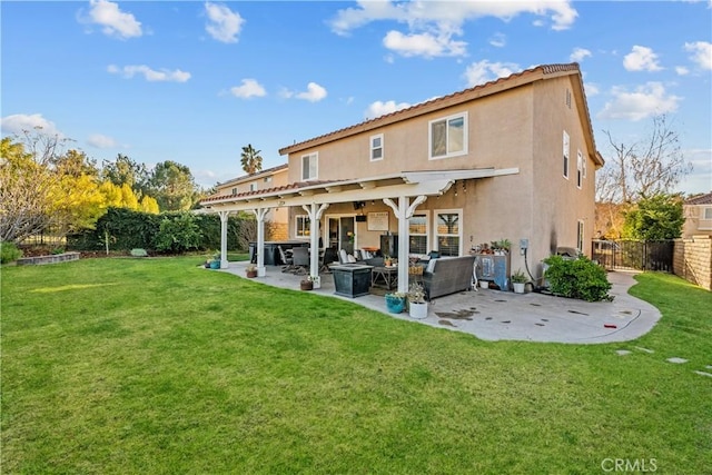 back of house featuring a patio area, a fenced backyard, a yard, and stucco siding