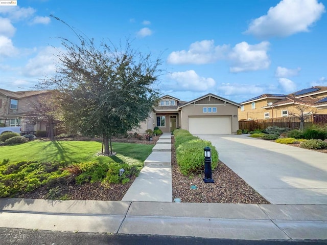 ranch-style home with a garage and a front lawn