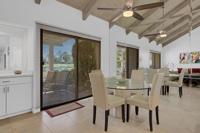 tiled dining area with beamed ceiling, wooden ceiling, high vaulted ceiling, and a wealth of natural light