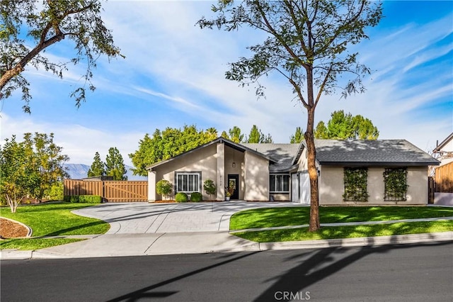 view of front of home with a front lawn