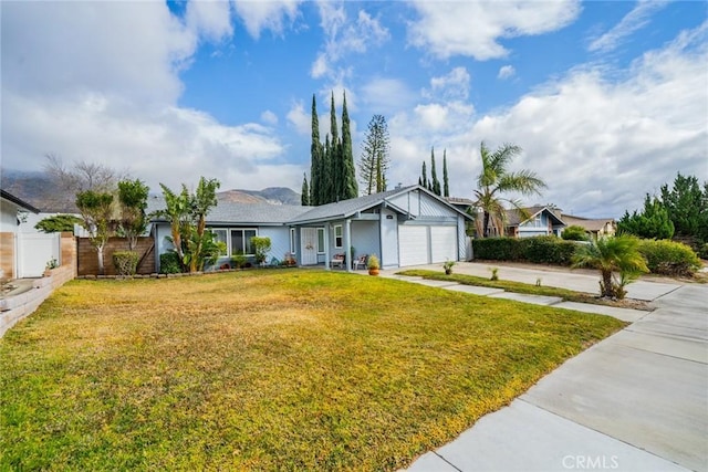 single story home with a garage and a front yard