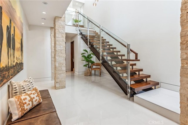 stairway with decorative columns