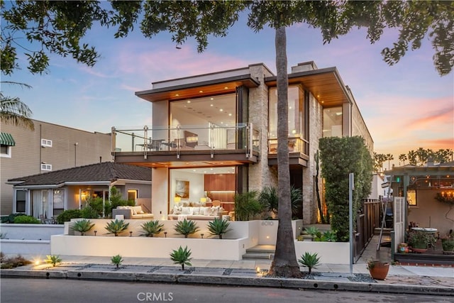 exterior space with a balcony