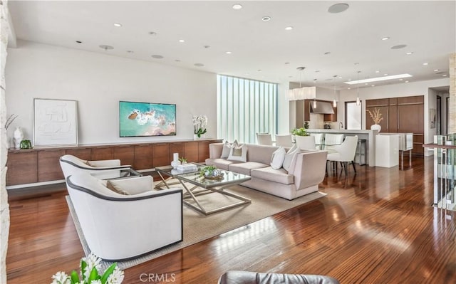 living room with dark wood-type flooring