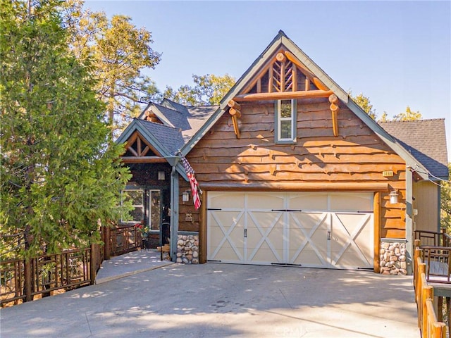 view of front of property featuring a garage