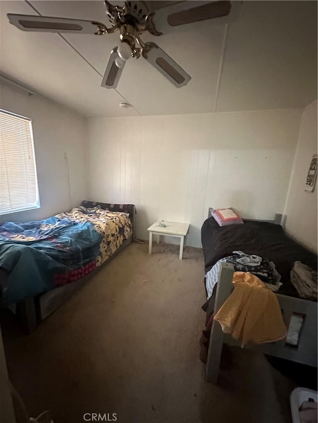 bedroom featuring carpet and ceiling fan