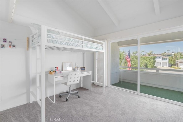 bedroom featuring lofted ceiling with beams and carpet floors