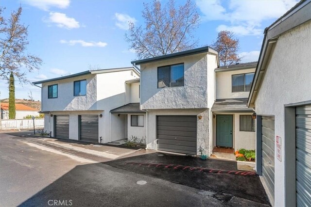 view of property featuring a garage