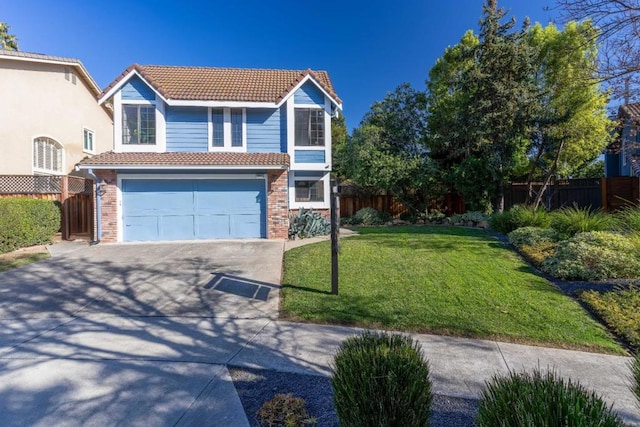 view of front property with a garage and a front yard