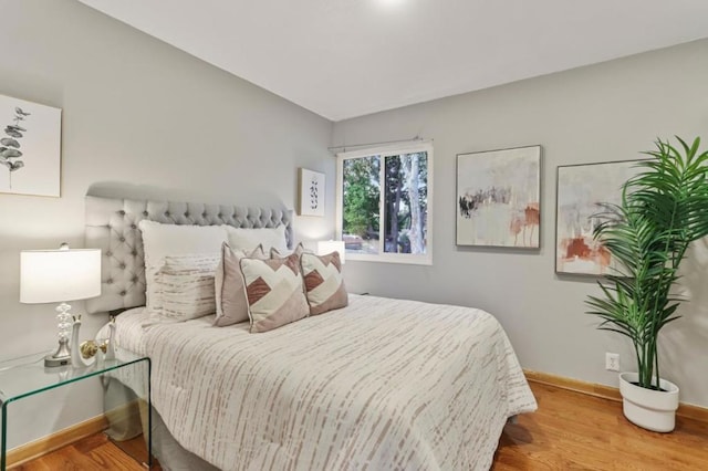 bedroom with light wood-type flooring