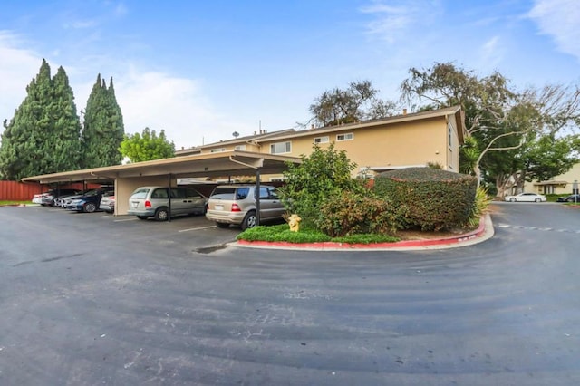 view of front of house featuring a carport