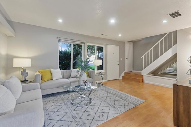 living room with hardwood / wood-style flooring