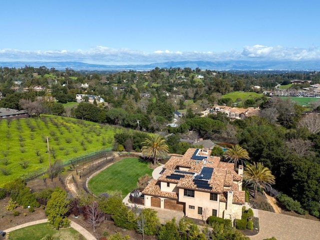 birds eye view of property with a rural view