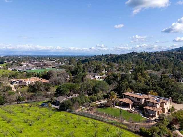 birds eye view of property with a rural view