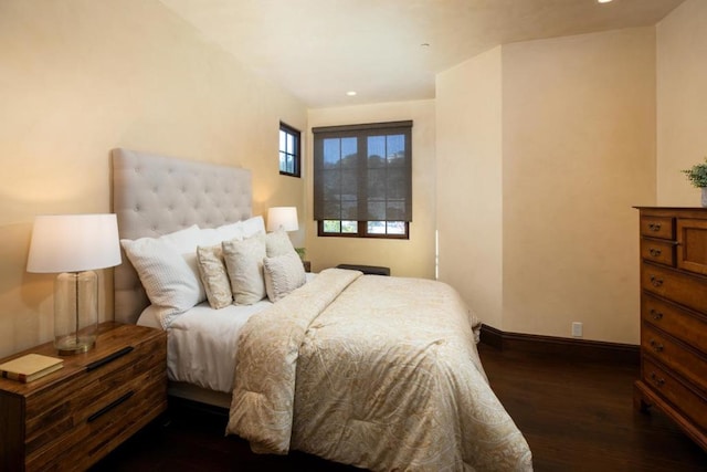 bedroom featuring dark wood-type flooring