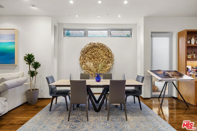 dining room featuring dark hardwood / wood-style flooring