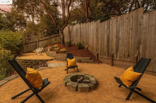 exterior space with an outdoor fire pit