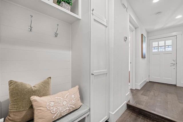 mudroom with dark hardwood / wood-style floors