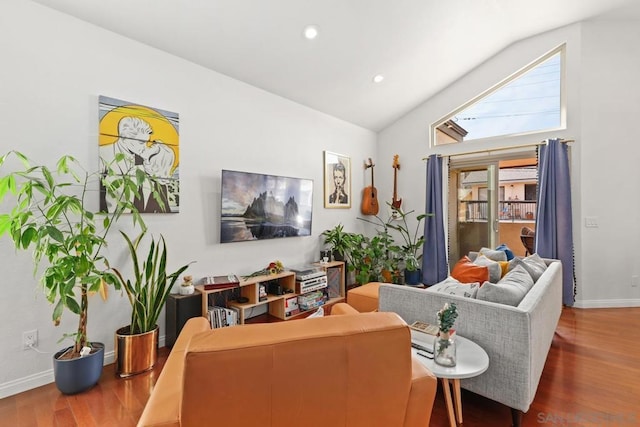 living room with lofted ceiling and wood-type flooring