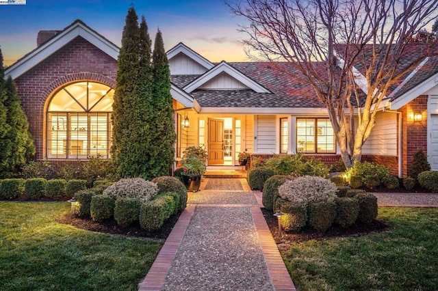 view of front of home with a yard