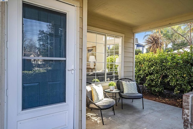 doorway to property with a patio area