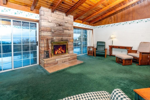 living room with wood ceiling, a stone fireplace, carpet floors, and vaulted ceiling with beams