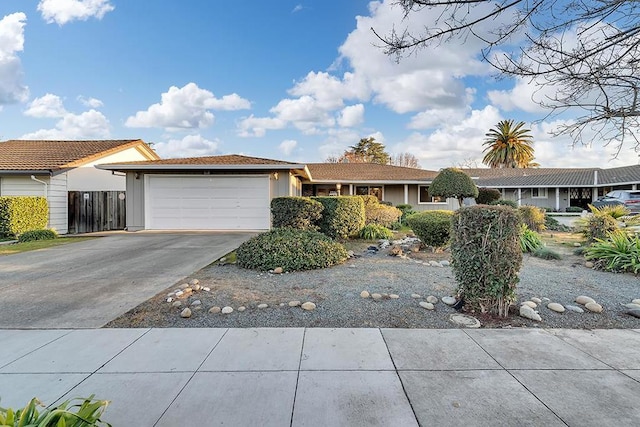 single story home with a garage