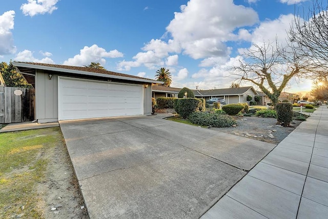 ranch-style home with a garage