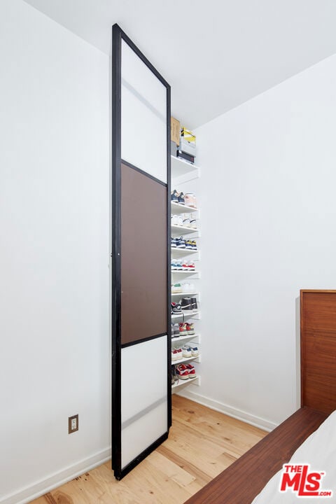 bedroom featuring light hardwood / wood-style floors