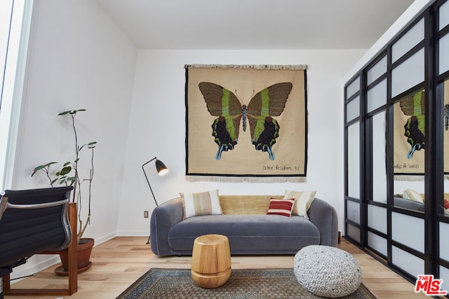 living area featuring hardwood / wood-style flooring