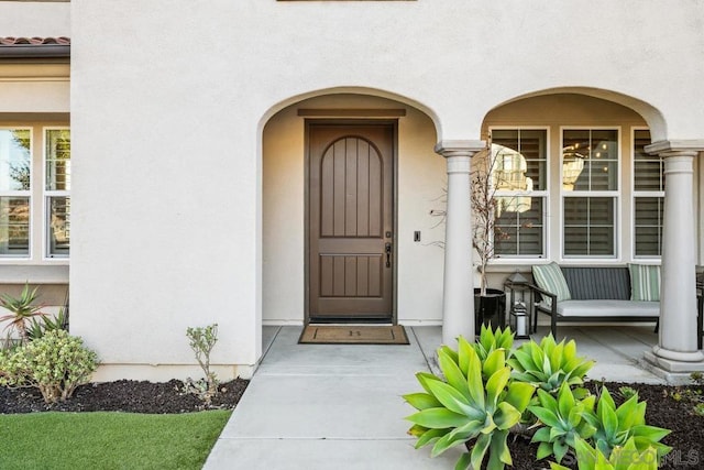 property entrance with a porch