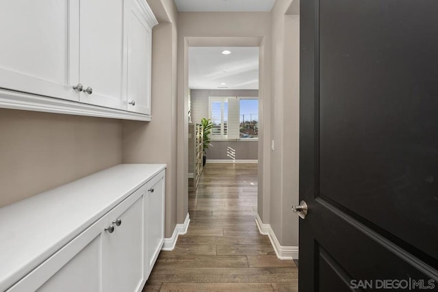 hallway featuring dark hardwood / wood-style floors