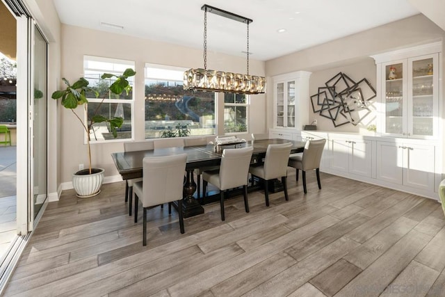 dining area featuring a healthy amount of sunlight