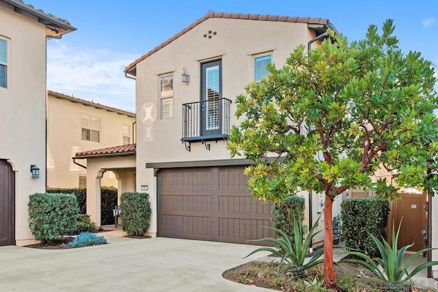 mediterranean / spanish-style house featuring a garage