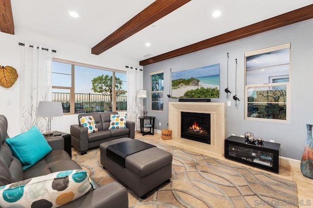 living room featuring beamed ceiling