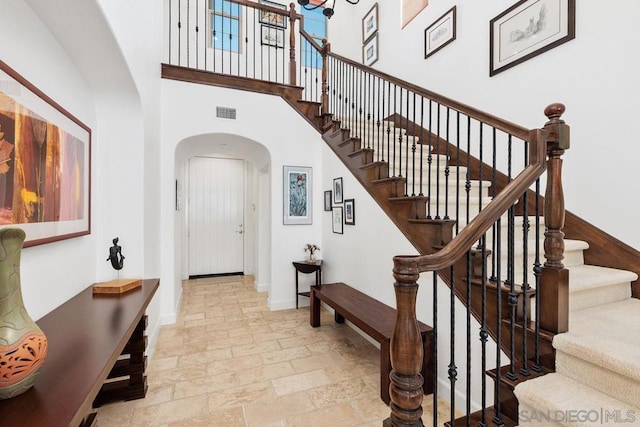 entrance foyer with a towering ceiling