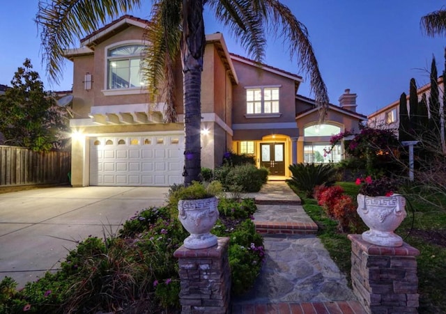 view of front of property featuring a garage