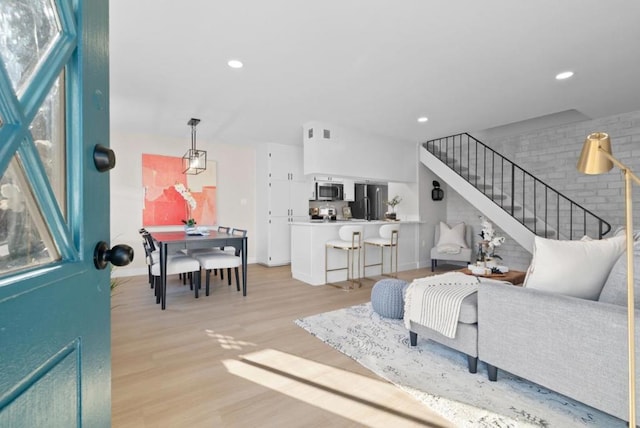 living room featuring light hardwood / wood-style flooring