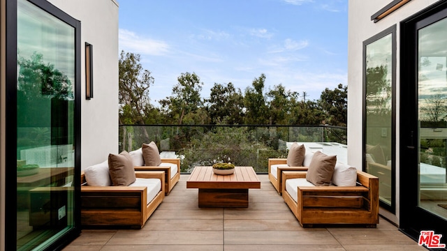 balcony with an outdoor hangout area