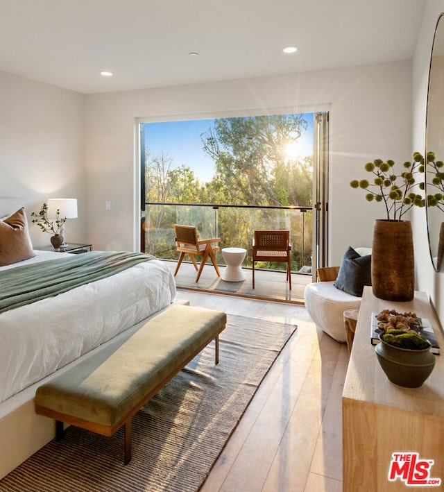 bedroom featuring wood-type flooring