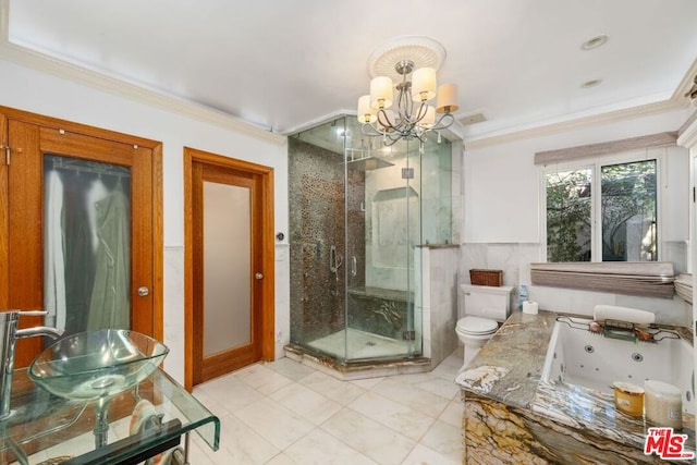 full bathroom with toilet, sink, an inviting chandelier, crown molding, and separate shower and tub