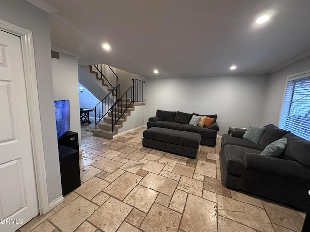 living room with ornamental molding