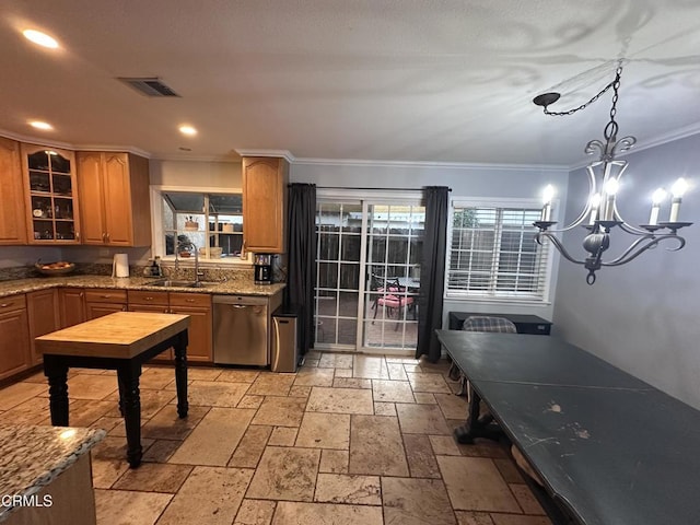 kitchen featuring sink, dishwasher, ornamental molding, light stone countertops, and decorative light fixtures