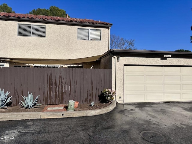 view of front of home featuring a garage