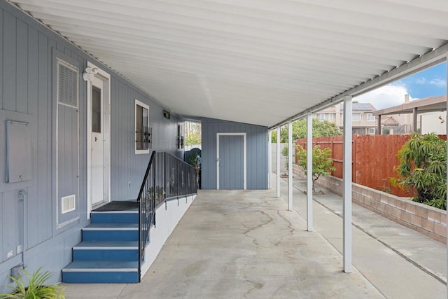 view of patio / terrace with a carport