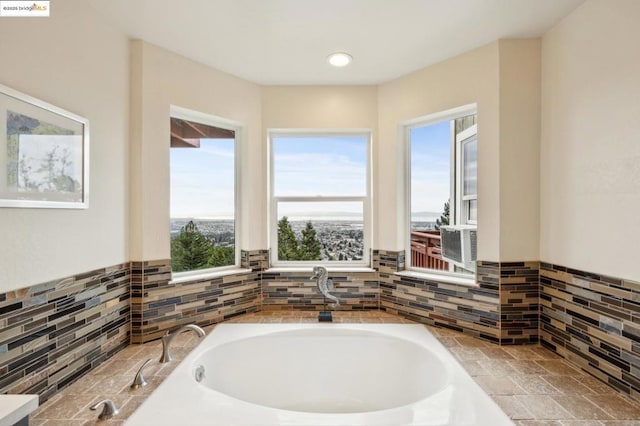 bathroom with a bathing tub