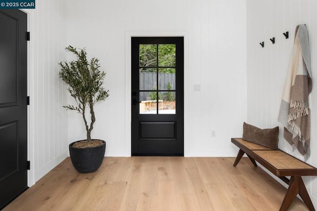 mudroom with light hardwood / wood-style floors