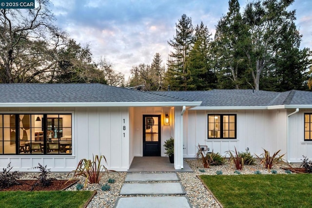 ranch-style home with a front lawn