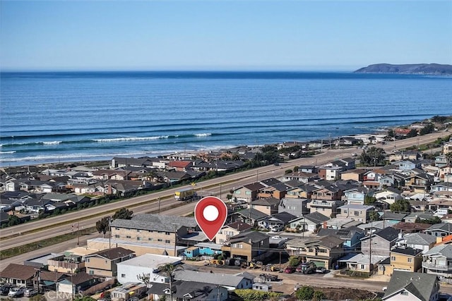 aerial view with a residential view and a water view